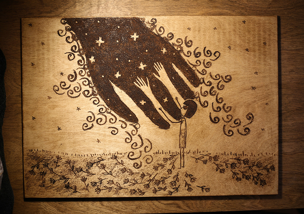 One drawing engraved on plywood. And finishing with antique wax