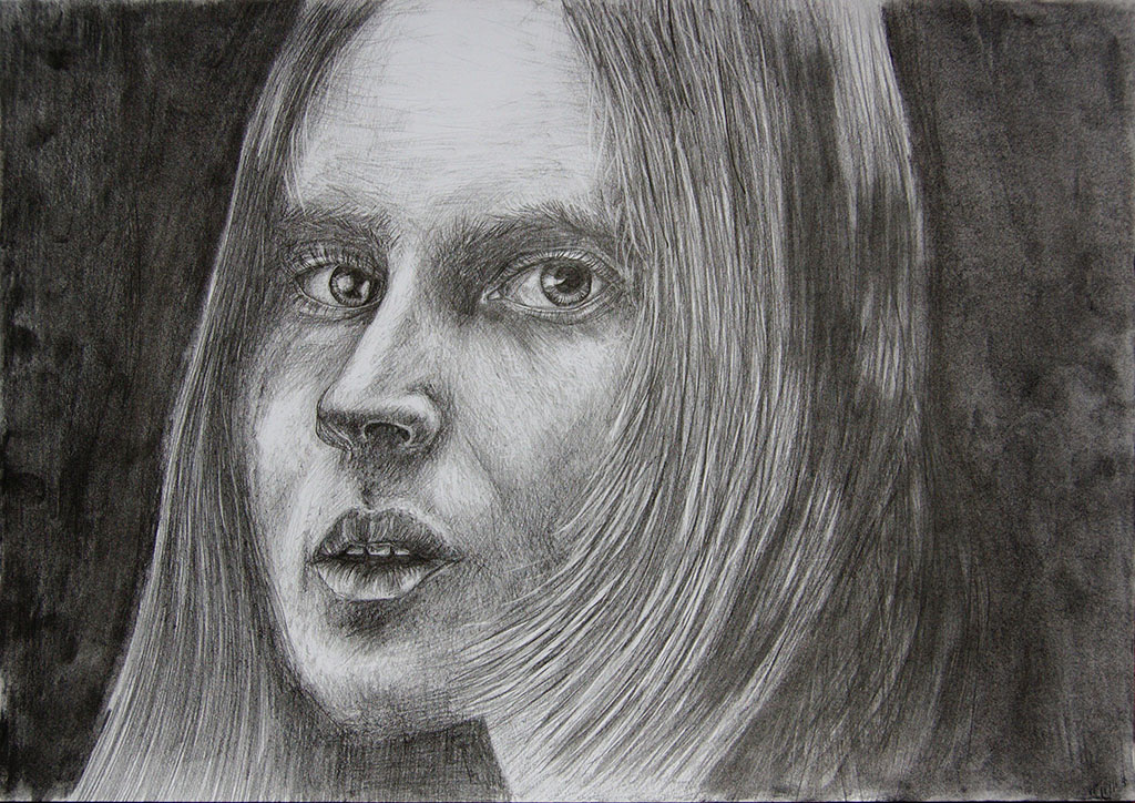 Face on the dark background. Drawing. Tauno Erik